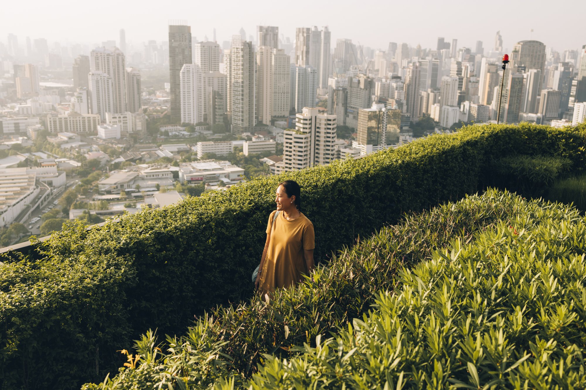 Image-Gallery_Image picture asian woman walking in a park in Bangkok 20250106 GLO EN